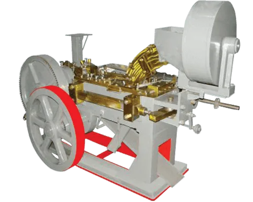 AUTOMATIC BOLT HEAD TRIMMING AND SHANK REDUCING MACHINE